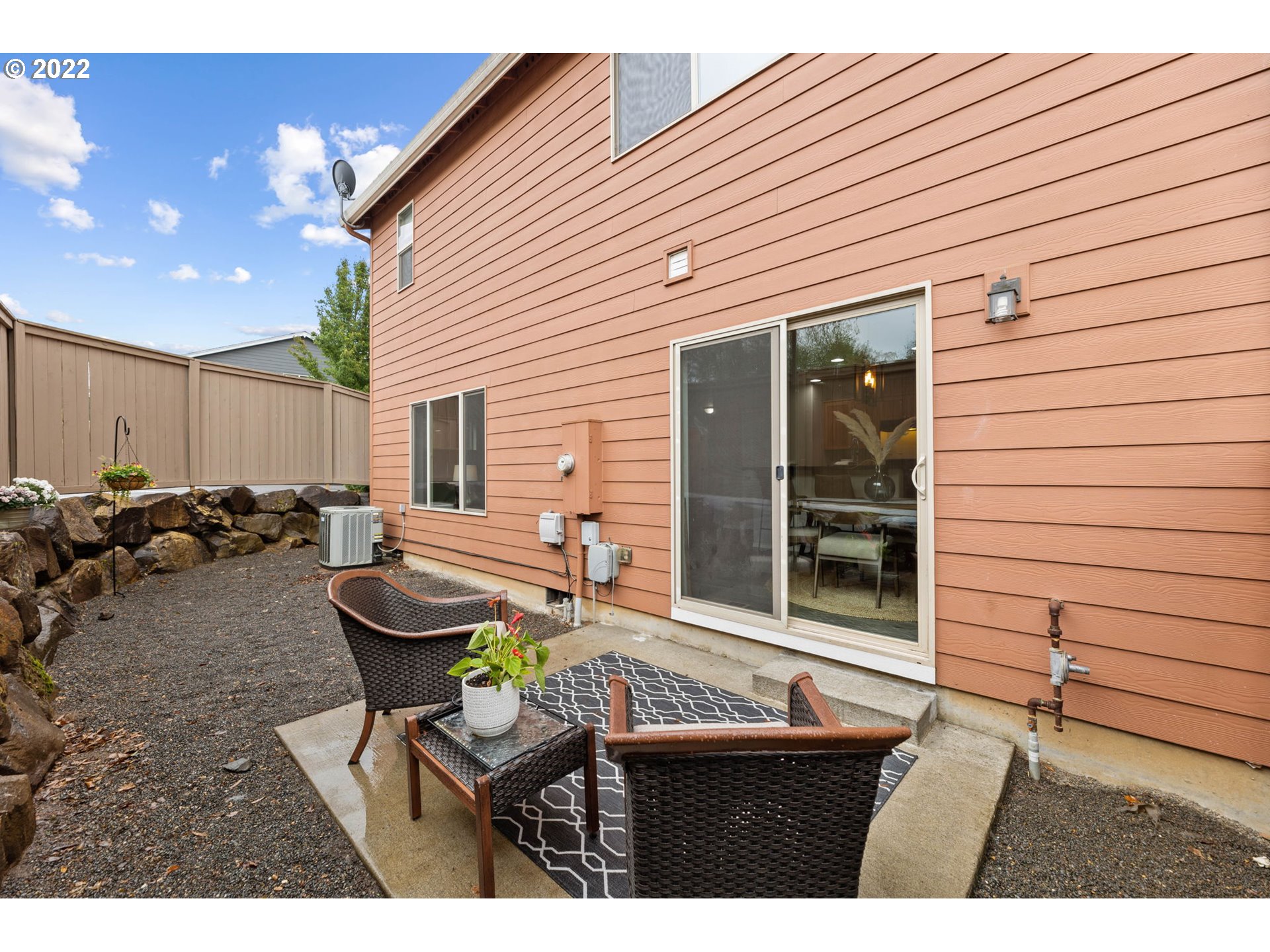 3301 Northwest 47th Drive Camas, WA 98607 - Photo 29 of 32 a backyard of a house with table and chairs