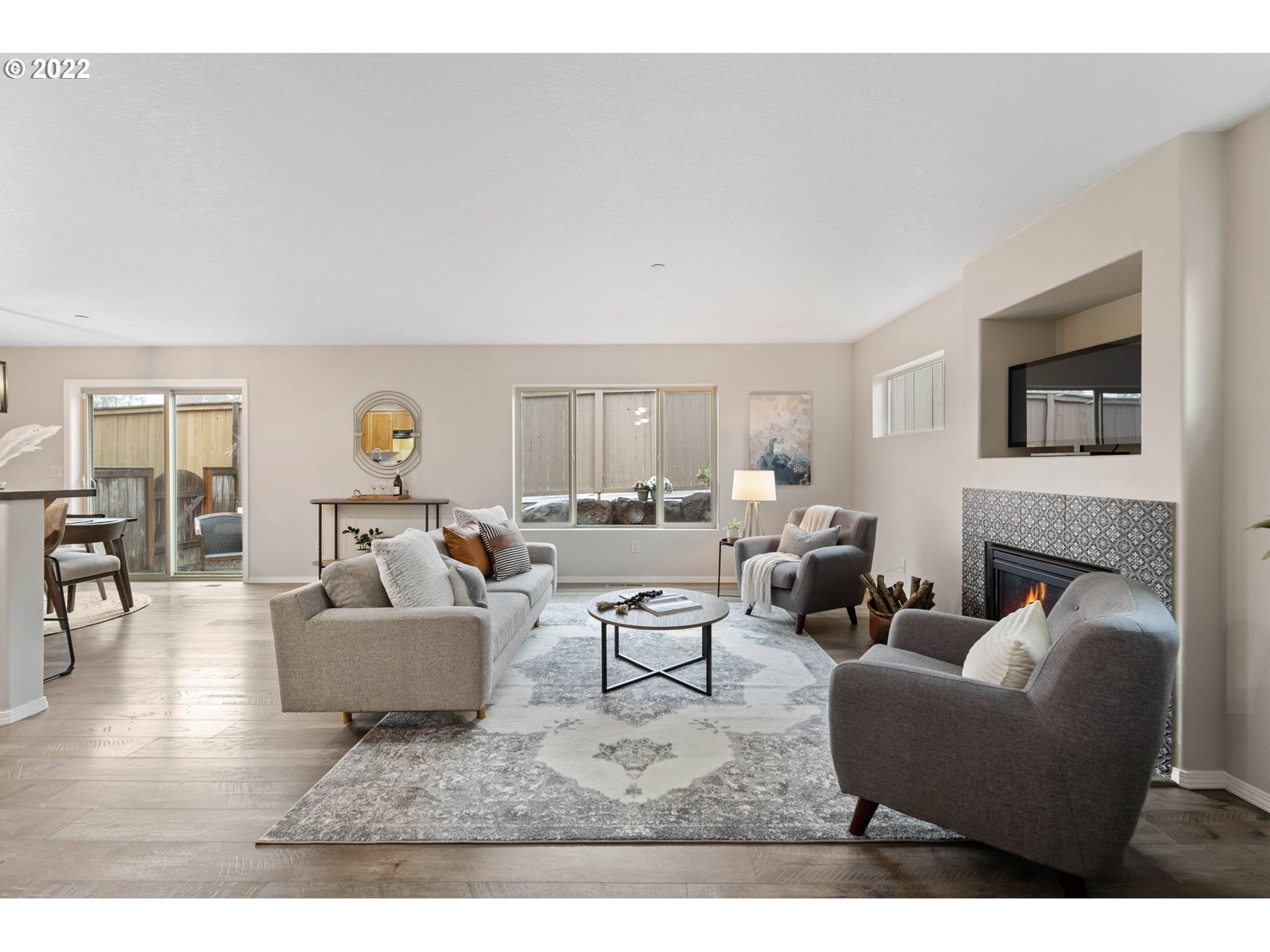 3301 Northwest 47th Drive Camas, WA 98607 - Photo 6 of 32 a living room with furniture and a fireplace