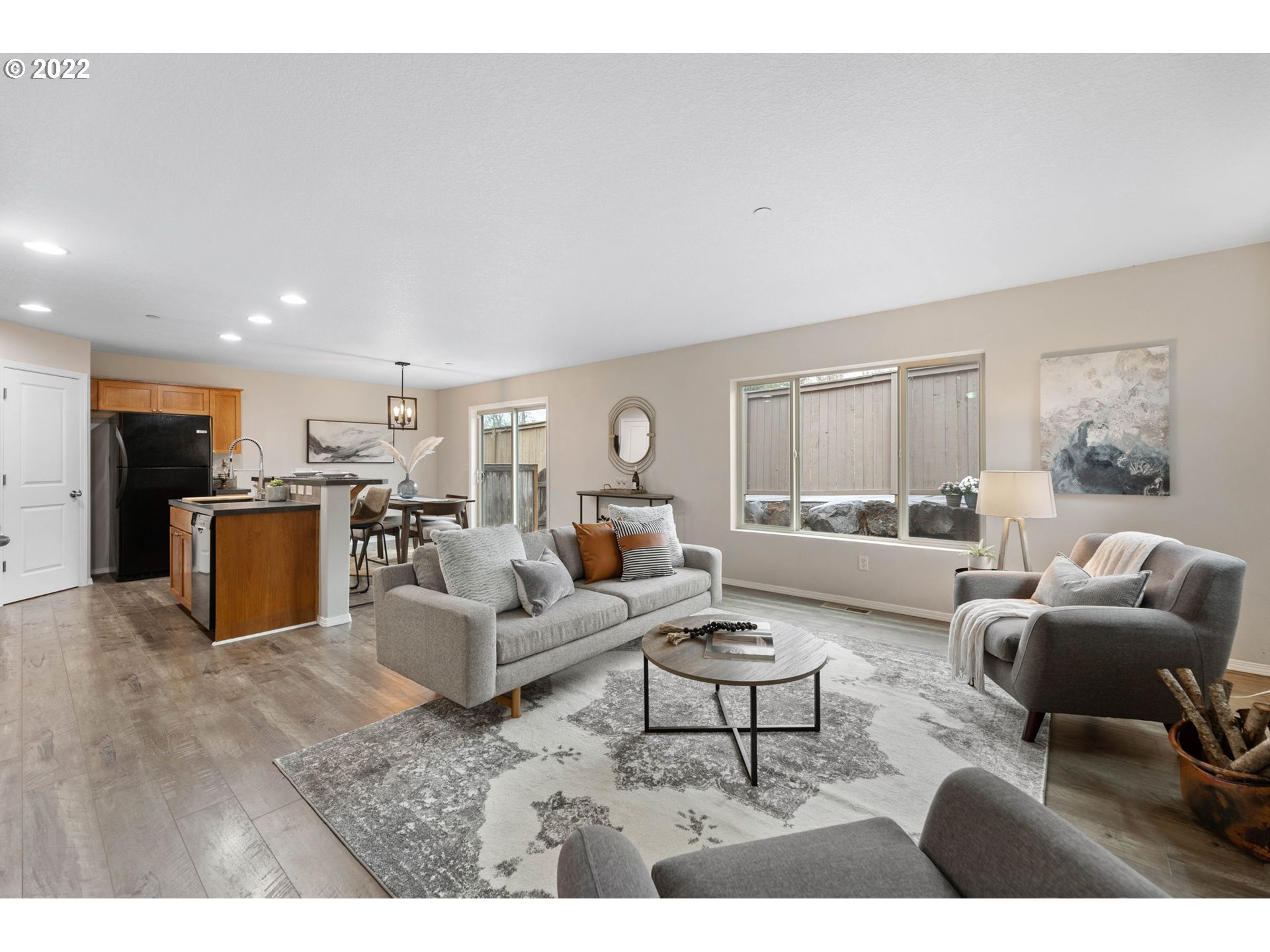 3301 Northwest 47th Drive Camas, WA 98607 - Photo 8 of 32 a living room with furniture white wooden floor and kitchen view