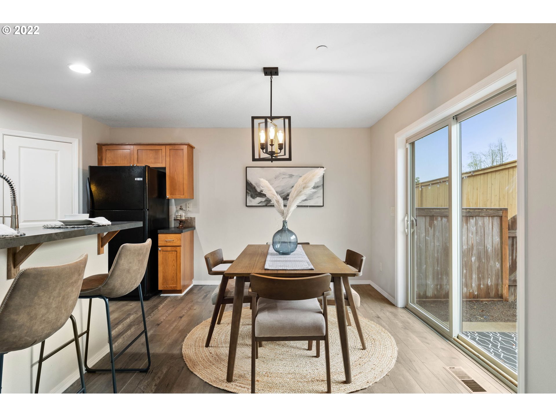 3301 Northwest 47th Drive Camas, WA 98607 - Photo 10 of 32 a view of a dining room with furniture and a window