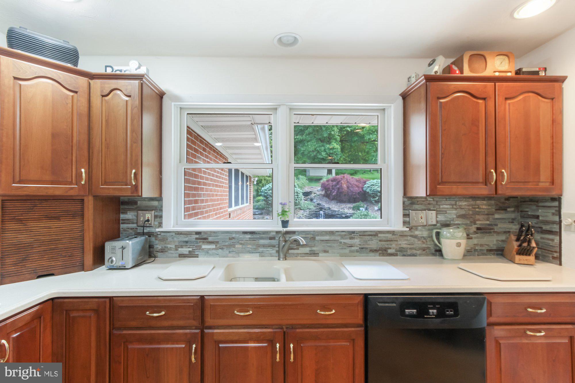 3380 Kingston Road York, PA 17402 - Photo 10 of 34 Do dishes as you watch the outdoor waterfall