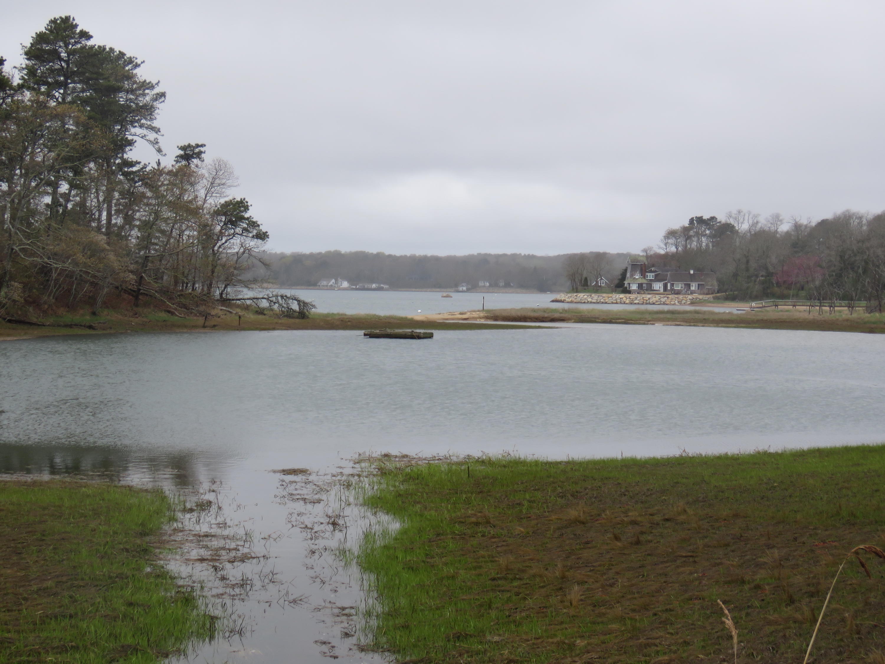 11 Quanset Road Orleans, MA 02653 - Photo 23 of 27 a view of a lake with houses in the back