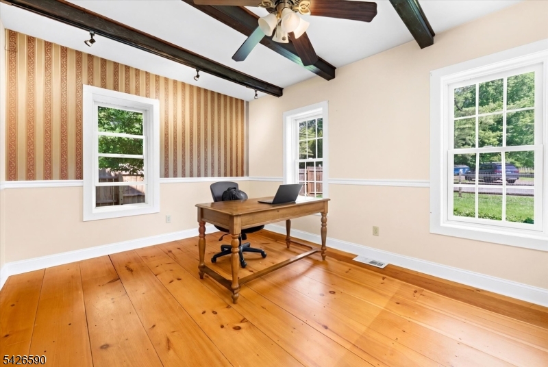 179 Lindbergh Road Hopewell, NJ 08525 - Photo 13 of 46 a workspace with wooden floor and a window