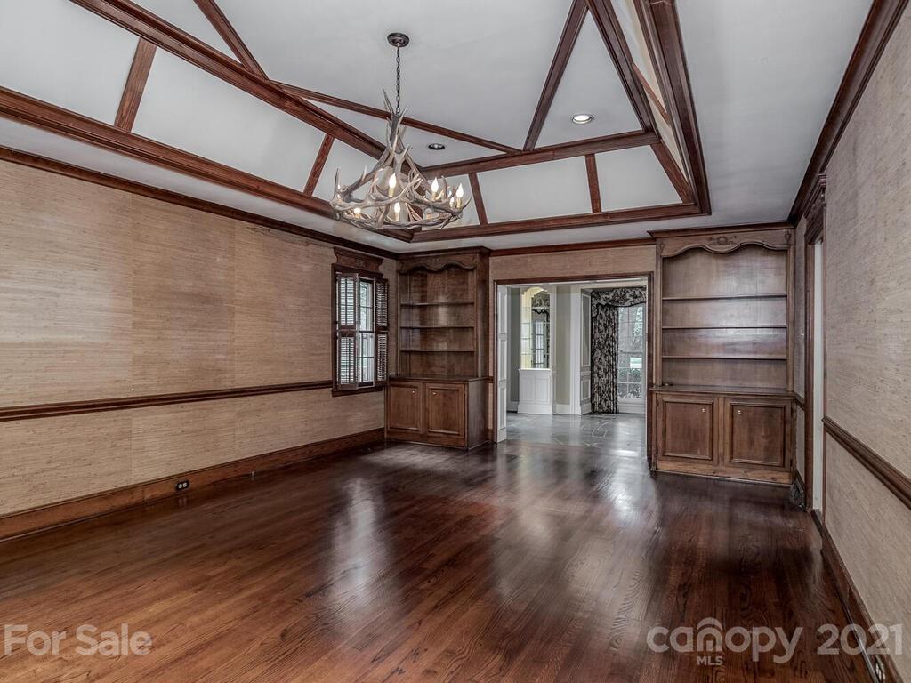2930 Wickersham Road Charlotte, NC 28211 - Photo 12 of 25 a view of a livingroom with wooden floor and stairs