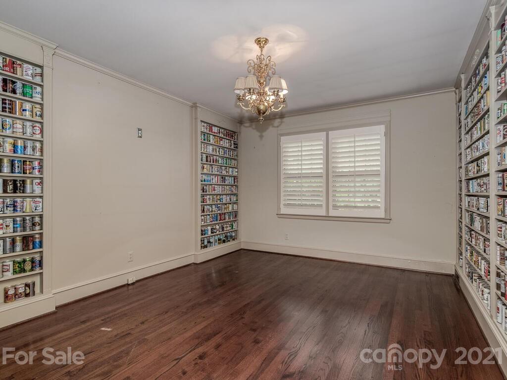 2930 Wickersham Road Charlotte, NC 28211 - Photo 16 of 25 a view of an empty room with wooden floor and a window
