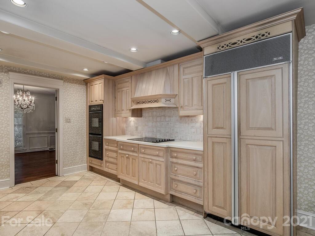 2930 Wickersham Road Charlotte, NC 28211 - Photo 8 of 25 a kitchen with stainless steel appliances granite countertop a refrigerator and a sink