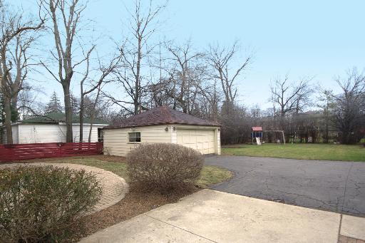 327 Bartram Road Riverside, IL 60546 - Photo 16 of 16 a view of a house with a yard