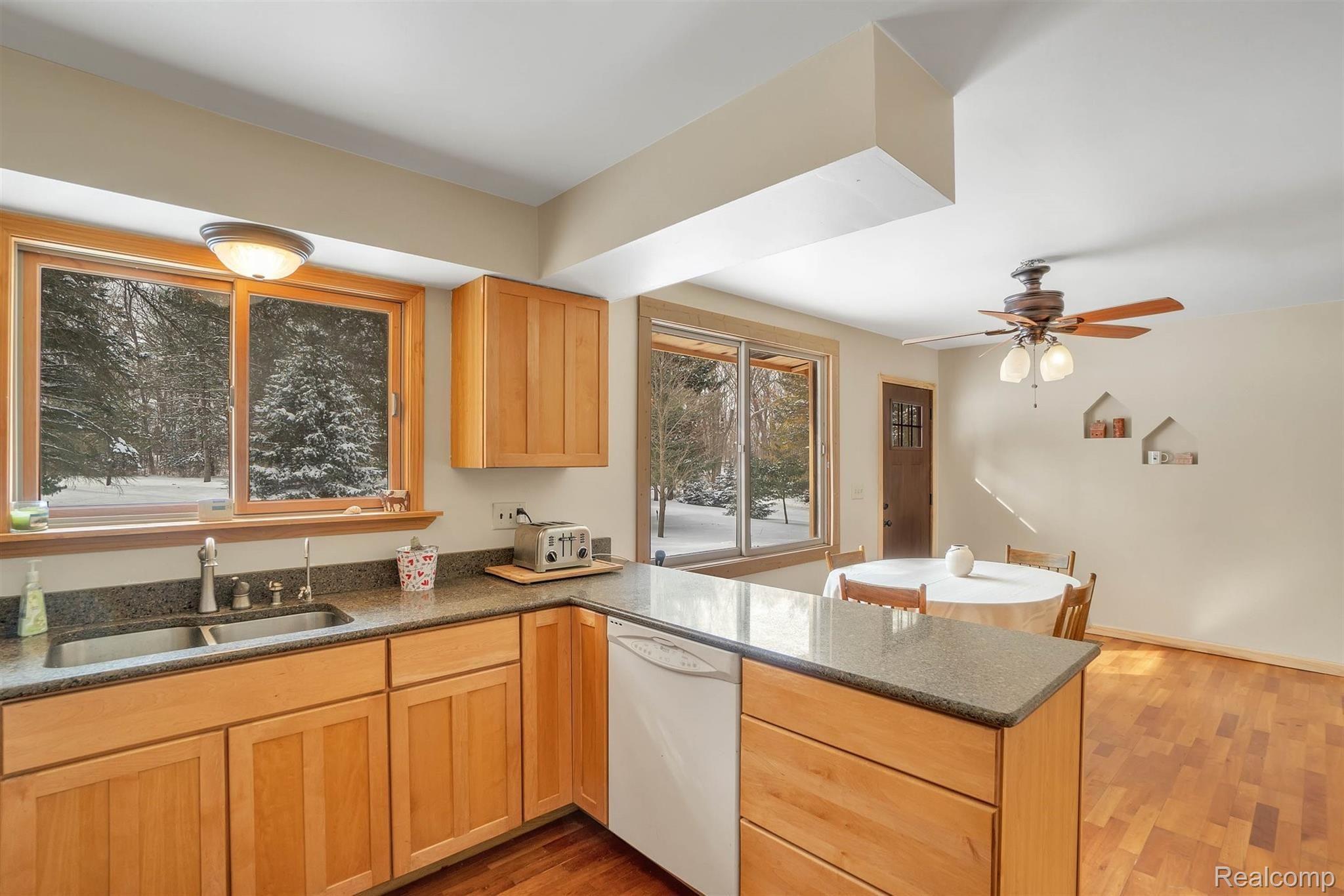 1084 Darwin Road Pinckney, MI 48169 - Photo 8 of 36 Kitchen is Open To Dining Area
