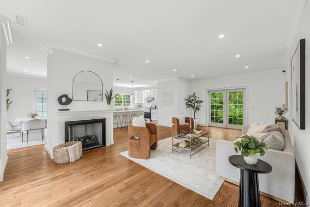 1 Kewanee Road New Rochelle, NY 10804 - Photo 18 of 36 a living room with furniture fireplace and potted plants