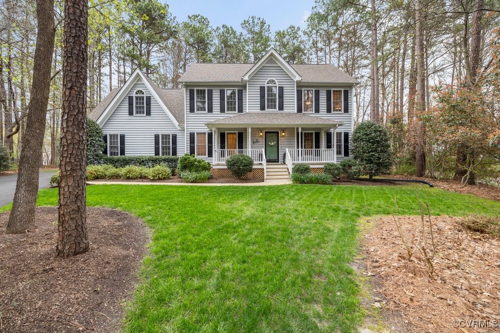 15306 Foxvale Way Midlothian, VA 23112 - Photo 1 of 41 a front view of a house with a yard and potted plants