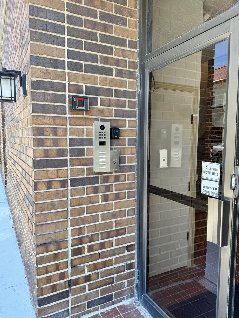 3239 Grove Avenue Berwyn, IL 60402 - Photo 16 of 16 a view of a door with wooden walls