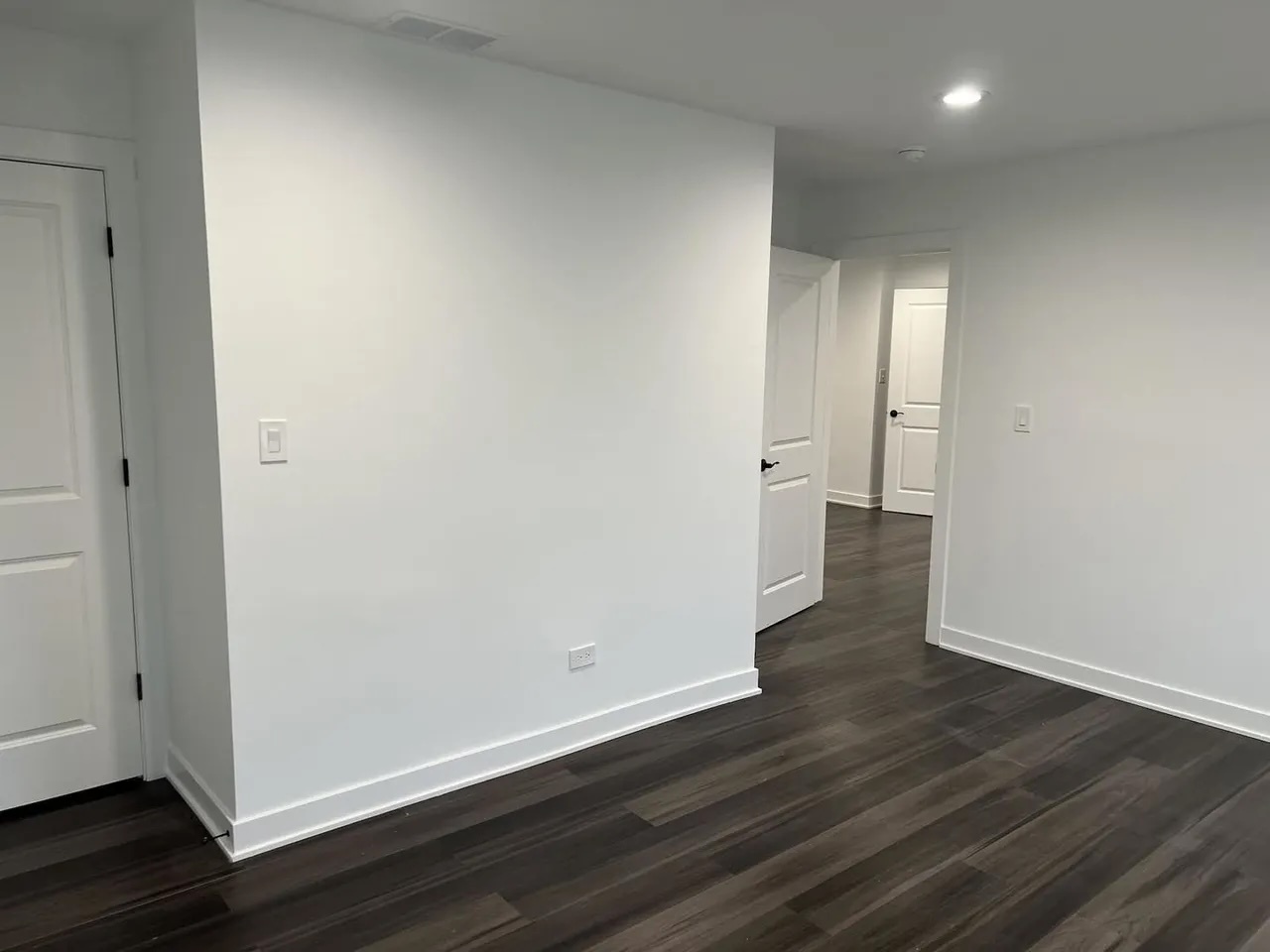 3239 Grove Avenue Berwyn, IL 60402 - Photo 10 of 16 a view of an empty room with wooden floor