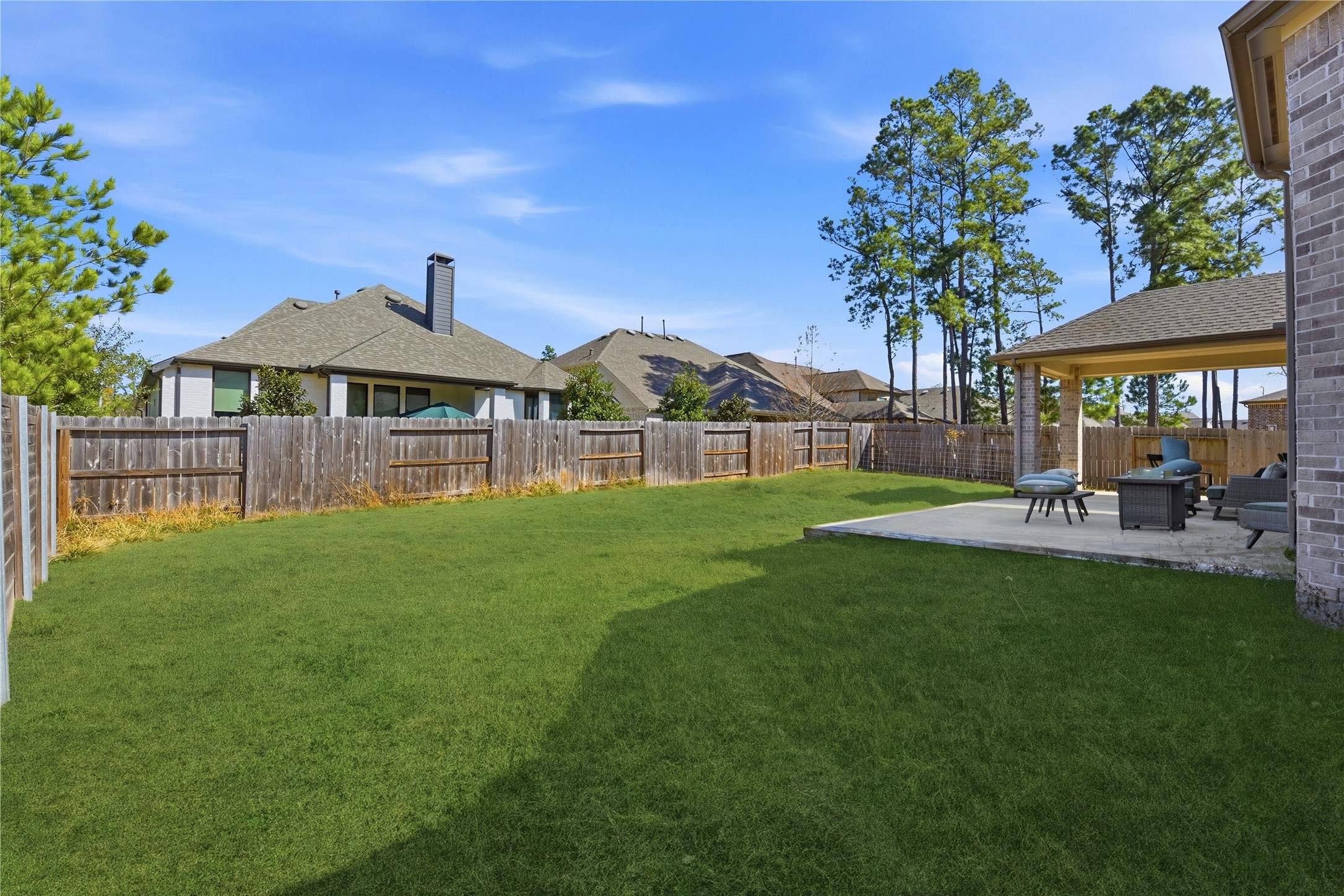 17501 Spice Merlot Lane Conroe, TX 77302 - Photo 49 of 50 a front view of a house with garden