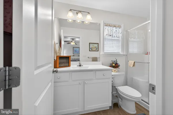 a view of a storage and utility room with washer and dryer