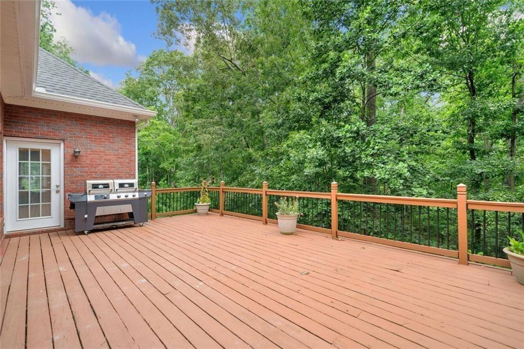 106 Shalea Lane Ball Ground, GA 30107 - Photo 4 of 52 a view of balcony with deck and wooden floor