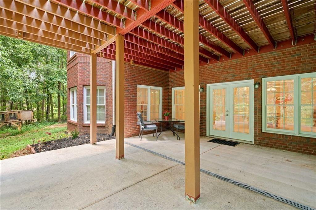 106 Shalea Lane Ball Ground, GA 30107 - Photo 51 of 52 a view of a room with porch and furniture