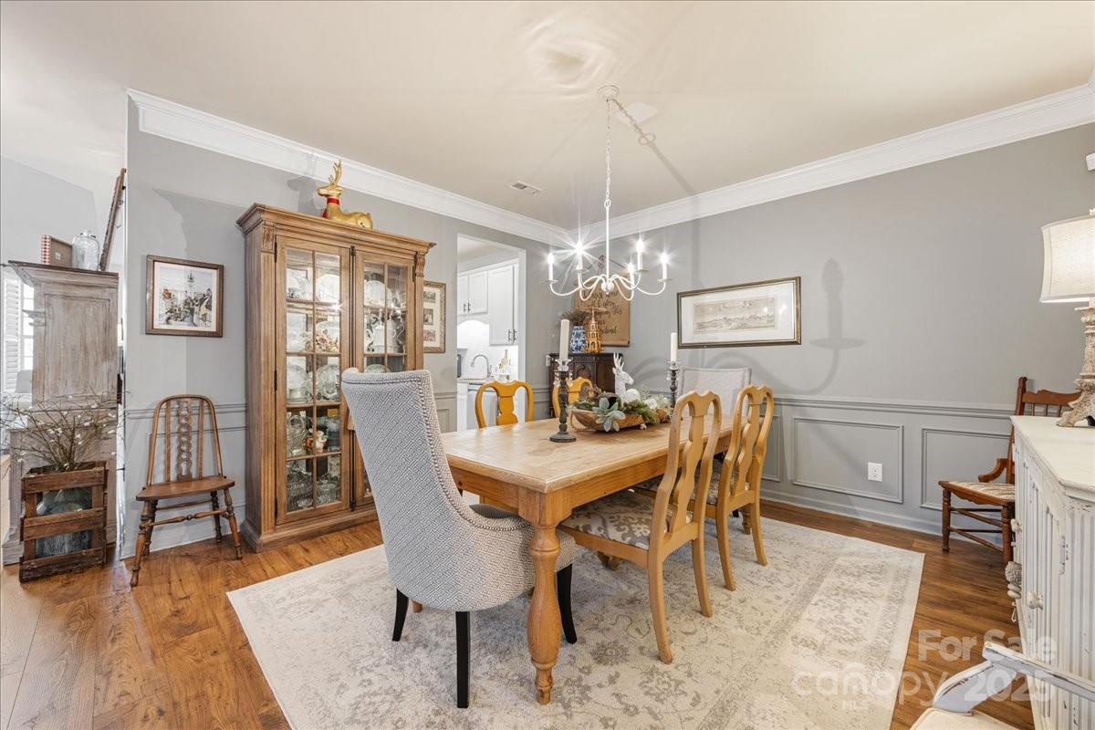 718 Deerbrook Lane Tega Cay, SC 29708 - Photo 11 of 45 a view of a dining room with furniture