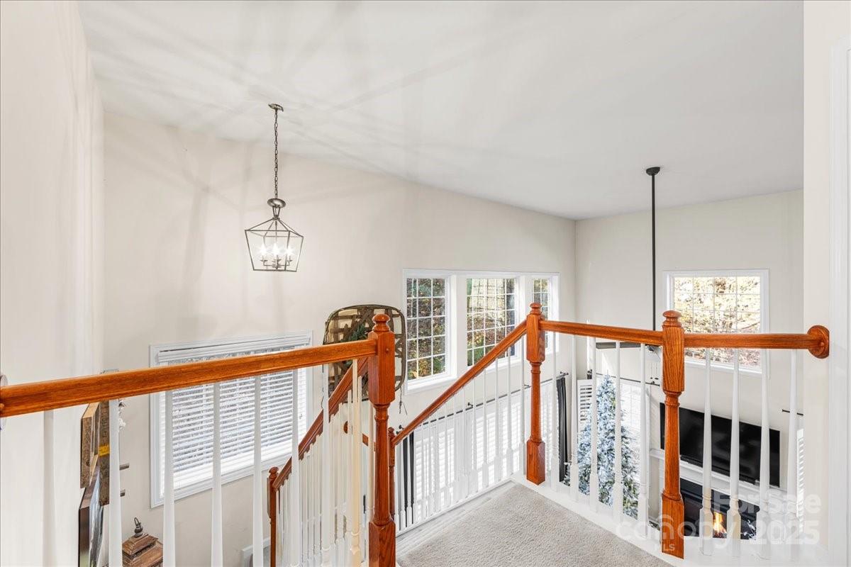 718 Deerbrook Lane Tega Cay, SC 29708 - Photo 28 of 45 a view of a hallway with windows
