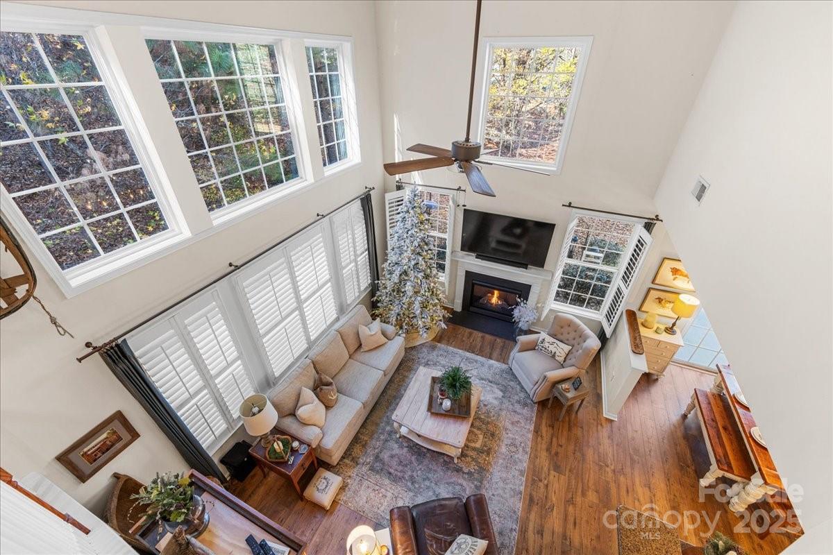 718 Deerbrook Lane Tega Cay, SC 29708 - Photo 29 of 45 an aerial view of a fireplace with wooden floor