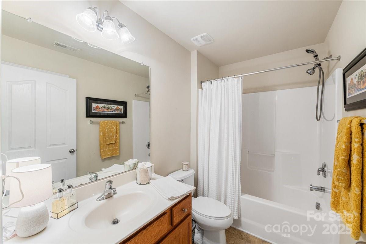 718 Deerbrook Lane Tega Cay, SC 29708 - Photo 38 of 45 a bathroom with a sink toilet and shower