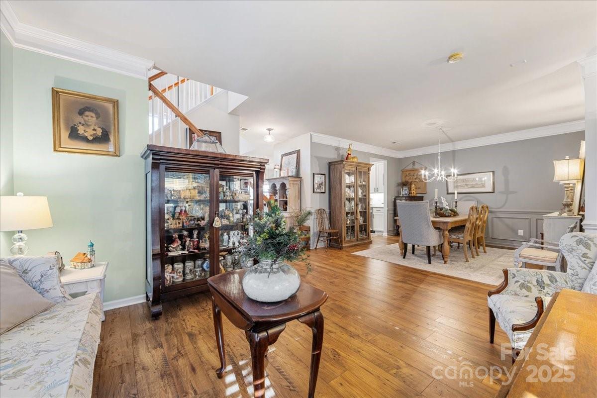 718 Deerbrook Lane Tega Cay, SC 29708 - Photo 9 of 45 a living room with lots of furniture and wooden floor