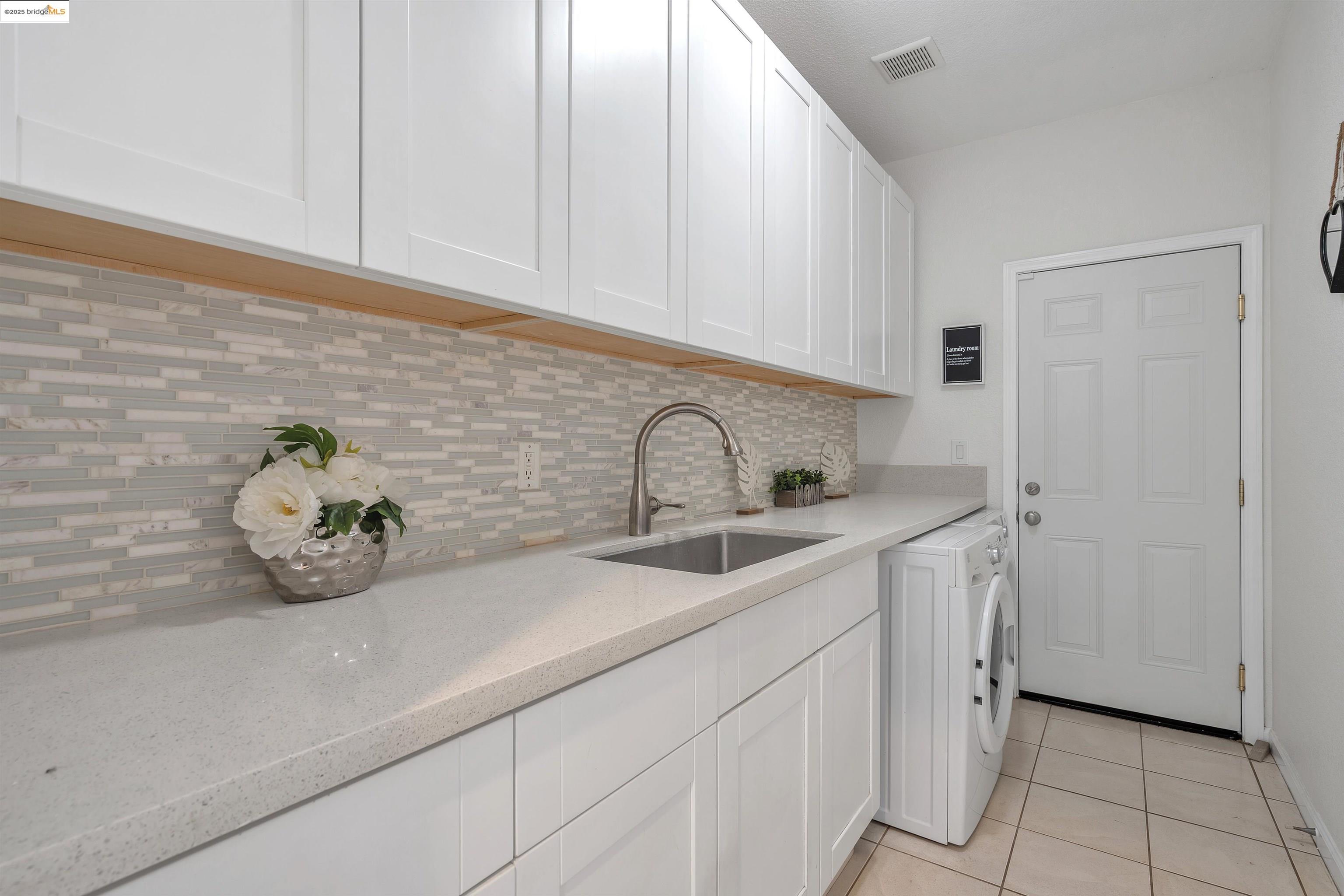 166 Rangewood Drive Pittsburg, CA 94565 - Photo 18 of 42 a close view of sink and tap