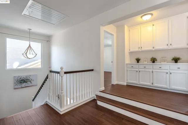 a bed room with bed and a window