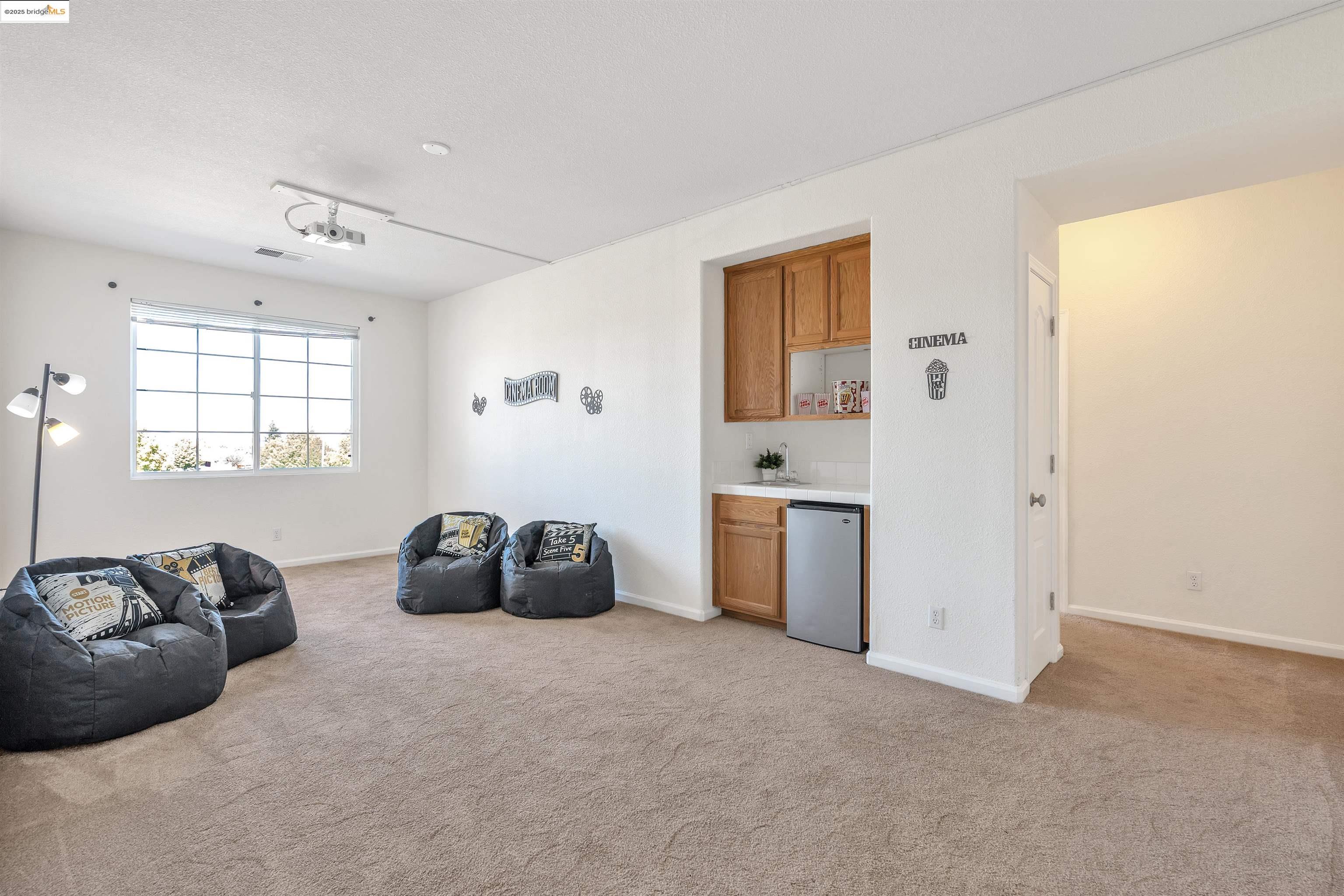 166 Rangewood Drive Pittsburg, CA 94565 - Photo 30 of 42 a bedroom with furniture and a window