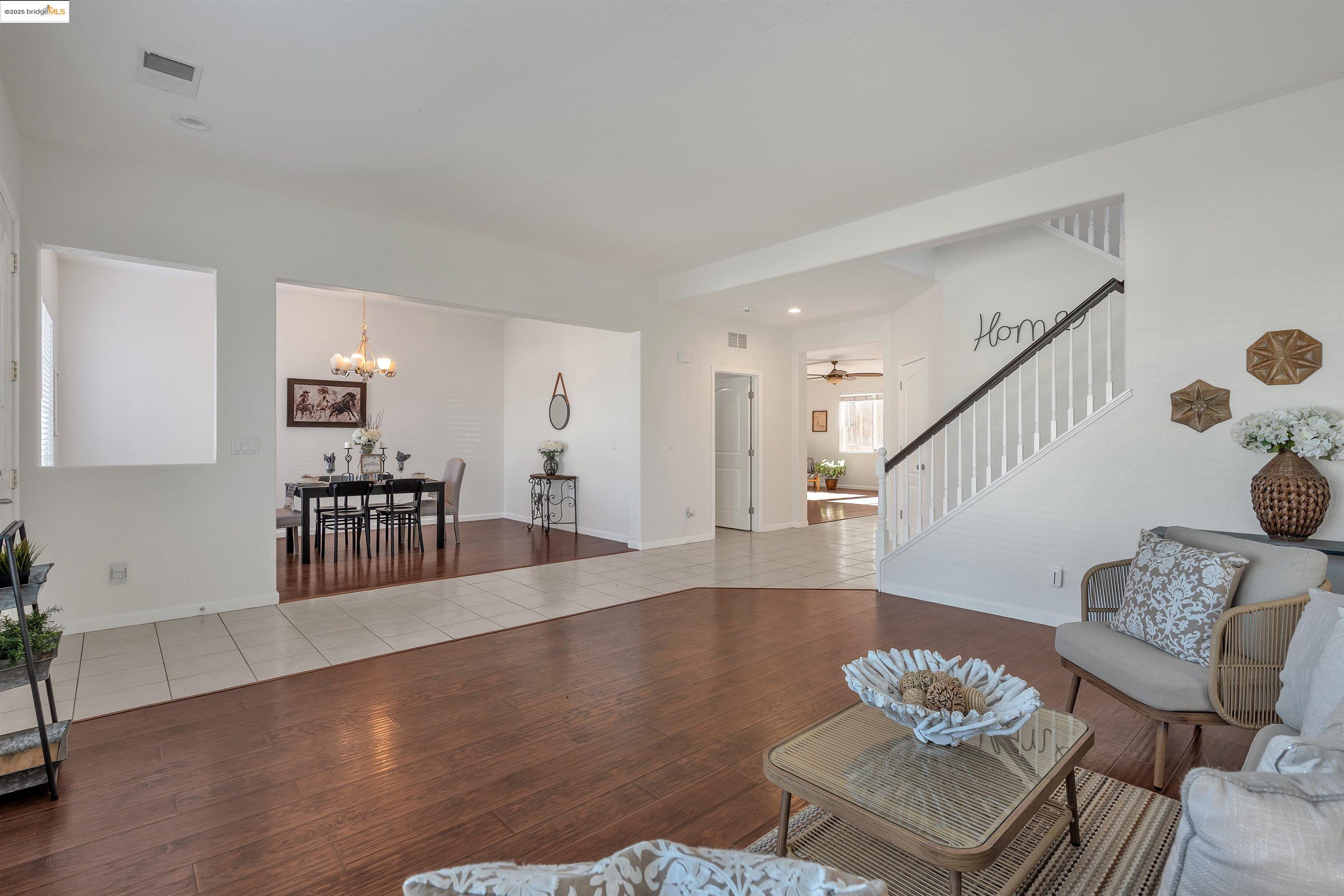 166 Rangewood Drive Pittsburg, CA 94565 - Photo 3 of 42 a living room with furniture and wooden floor