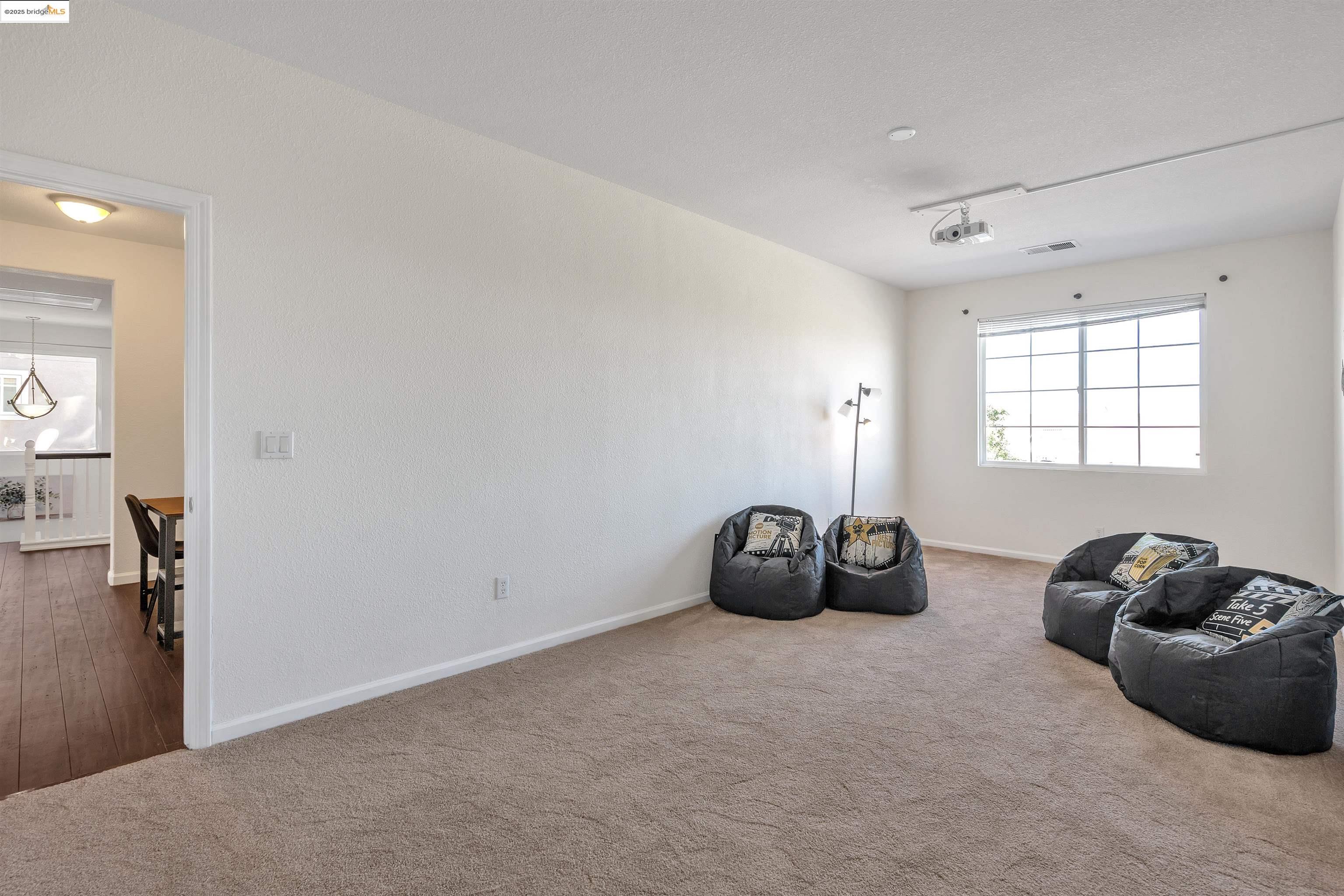 166 Rangewood Drive Pittsburg, CA 94565 - Photo 31 of 42 a room with a bed and a window