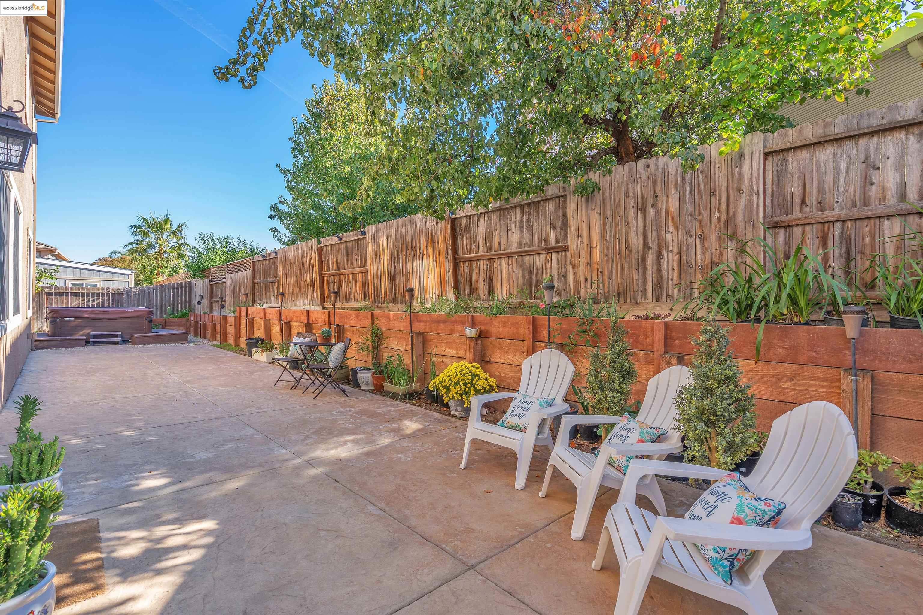 166 Rangewood Drive Pittsburg, CA 94565 - Photo 36 of 42 a backyard of a house with table and chairs