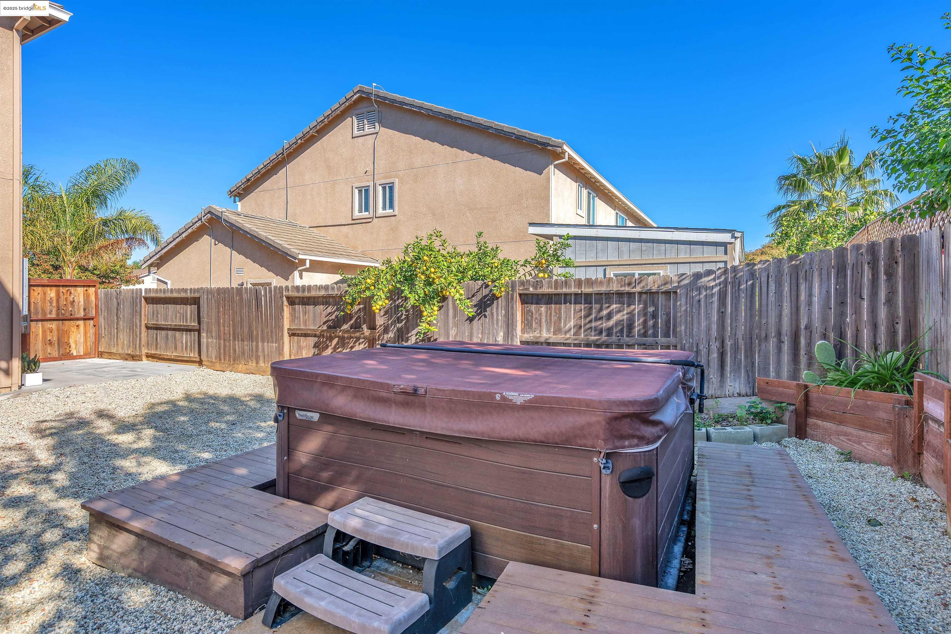 166 Rangewood Drive Pittsburg, CA 94565 - Photo 38 of 42 a front view of a house with garden