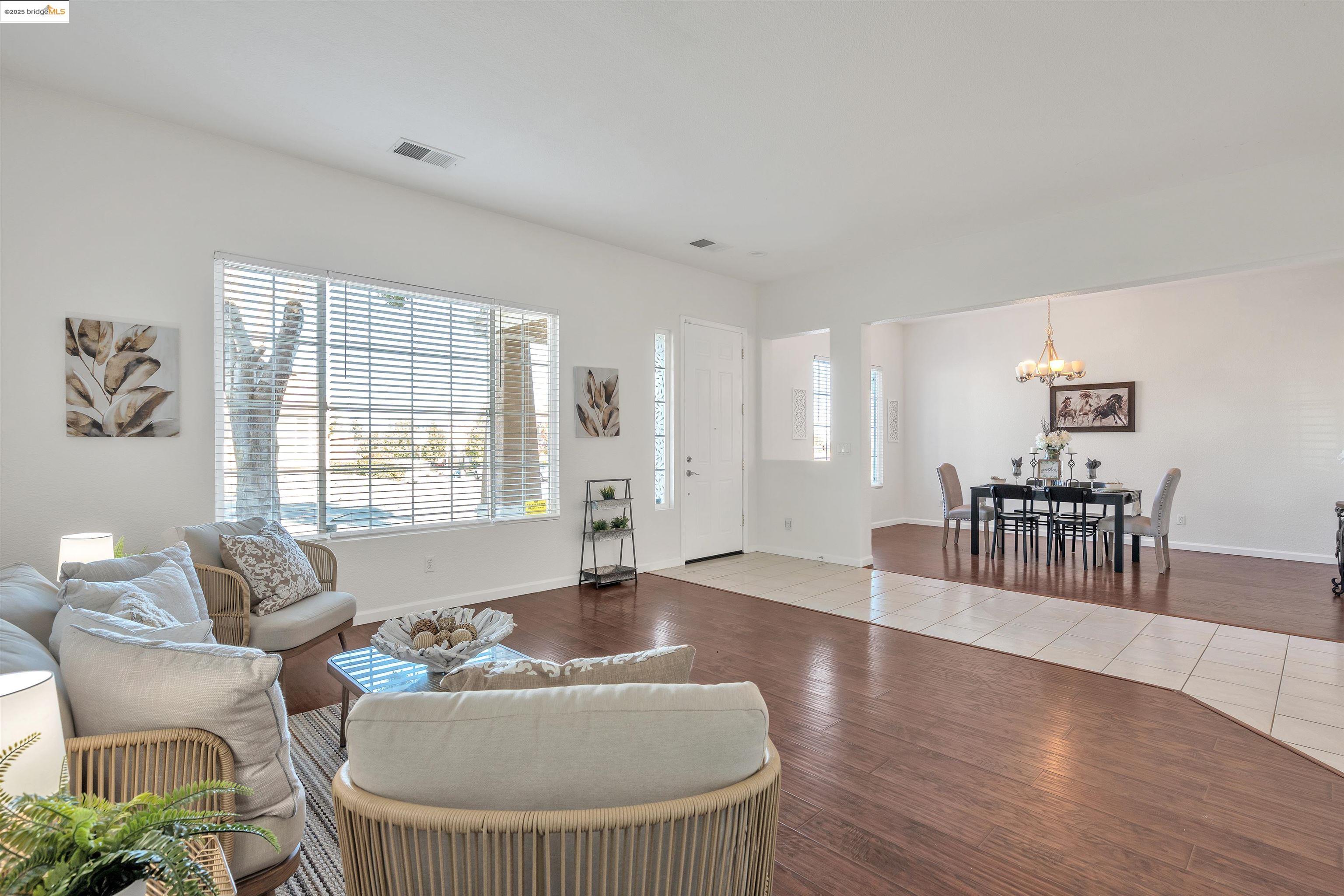 166 Rangewood Drive Pittsburg, CA 94565 - Photo 4 of 42 a living room with furniture and wooden floor
