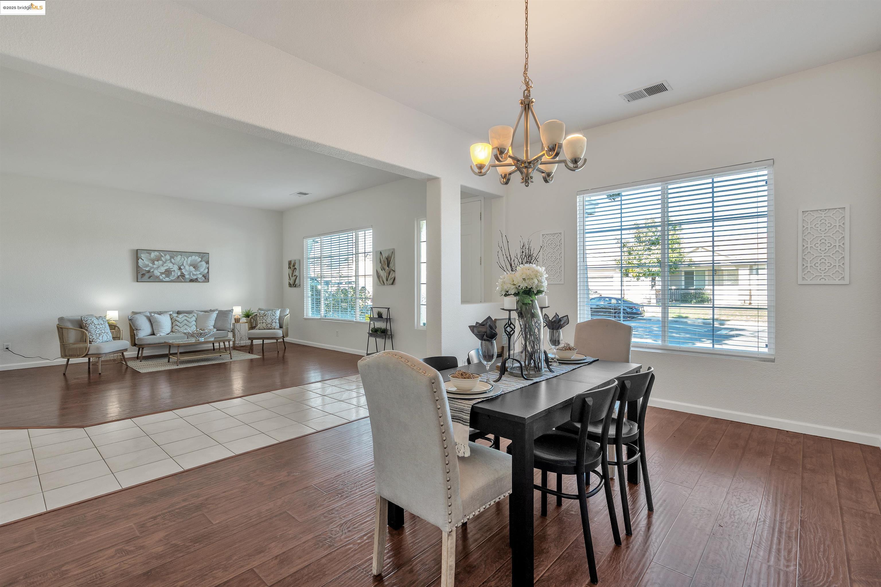 166 Rangewood Drive Pittsburg, CA 94565 - Photo 7 of 42 a view of a dining room with furniture window and wooden floor