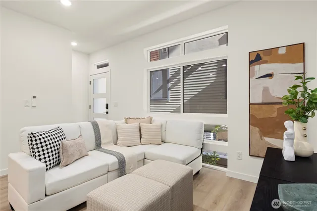 a kitchen with stainless steel appliances granite countertop white cabinets granite counter tops and a stove top oven