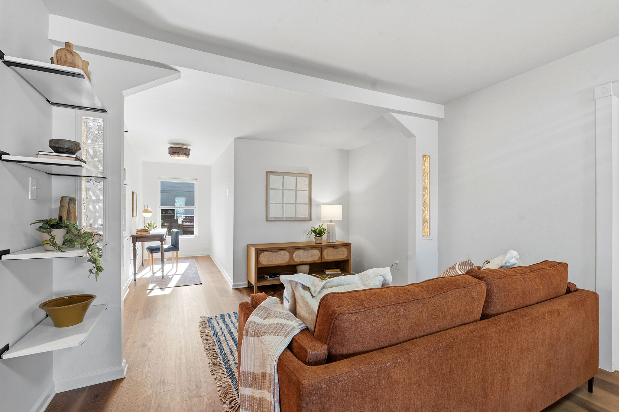 5509 Avenue F Austin, TX 78751 - Photo 40 of 40 The opened floor plan provides a seamless flow throughout the main living area with windows on both sides of the home that bring in peaceful natural light.