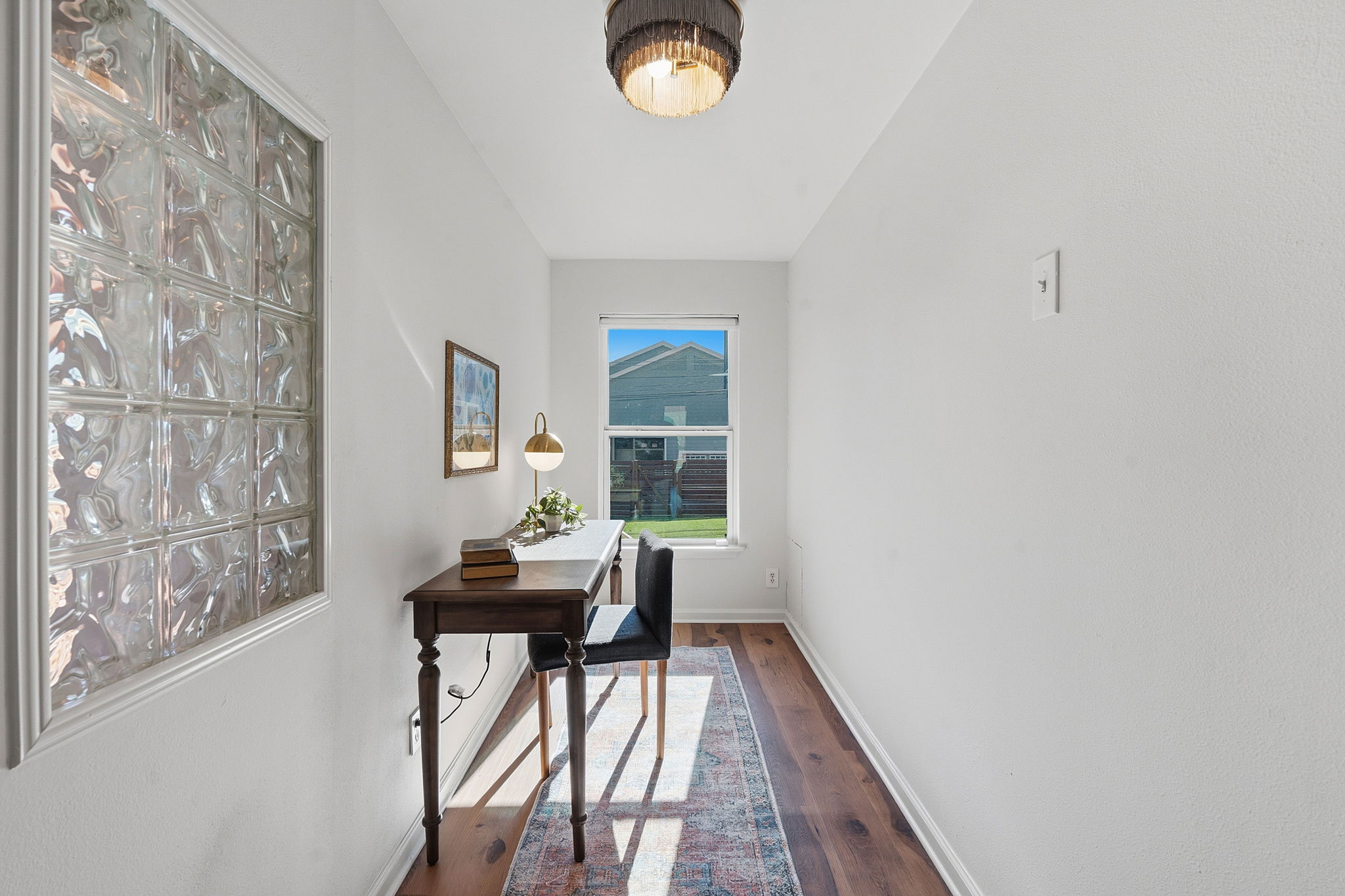 5509 Avenue F Austin, TX 78751 - Photo 14 of 40 A built-in office nook overlooks the backyard offering you excellent flexibility for use of space.