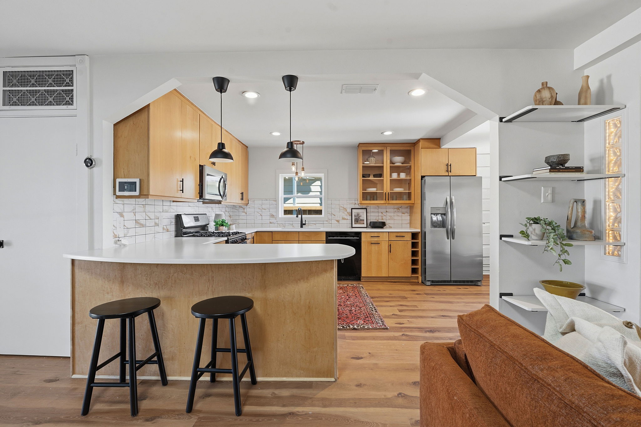 5509 Avenue F Austin, TX 78751 - Photo 15 of 40 The kitchen overlooks the main living area making it easy to stay connected while whipping up your favorite culinary delights.