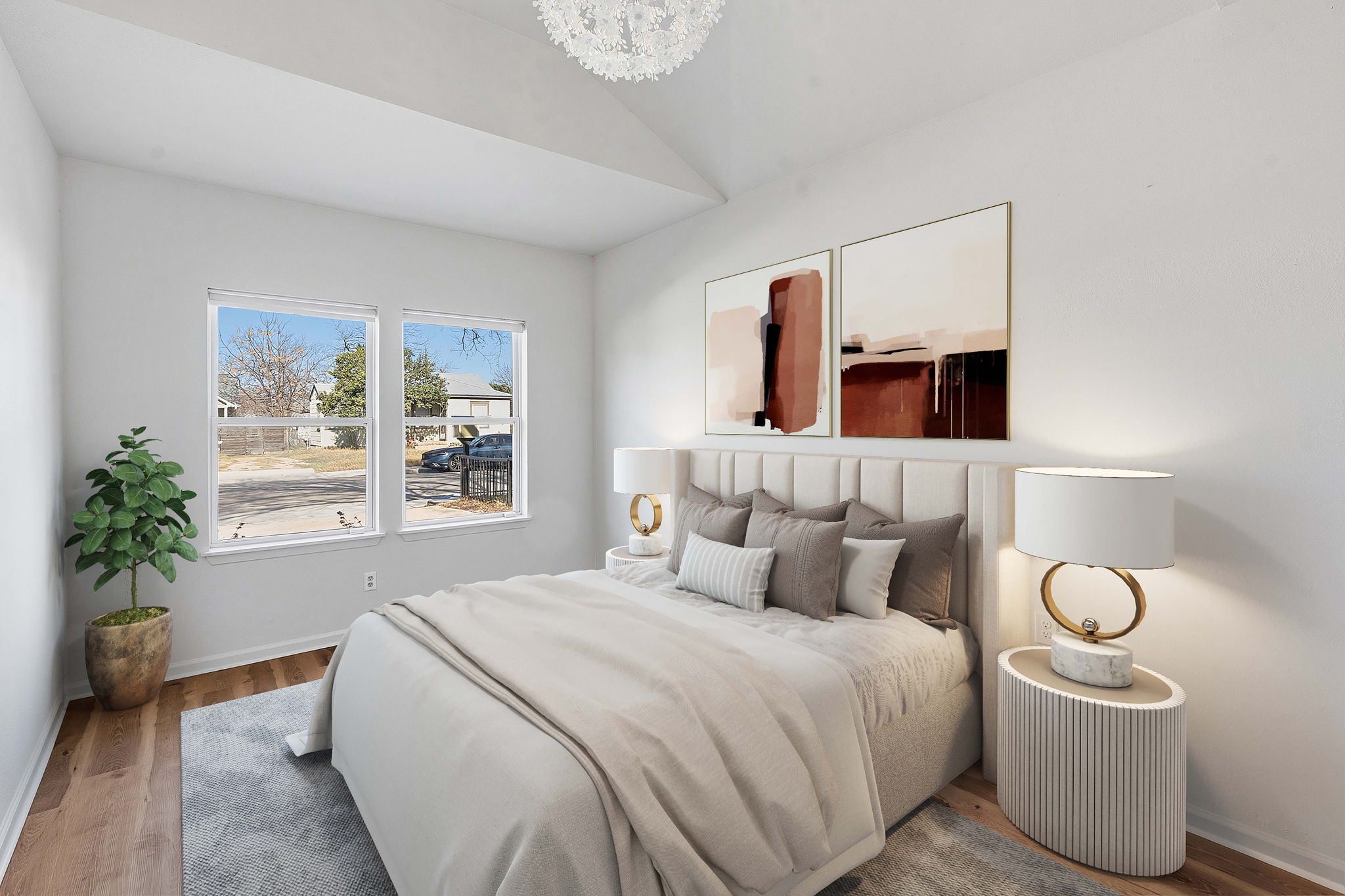 5509 Avenue F Austin, TX 78751 - Photo 21 of 40 One of two secondary bedrooms in the main house this one sits under tall ceilings and features the original restored hardwoods.