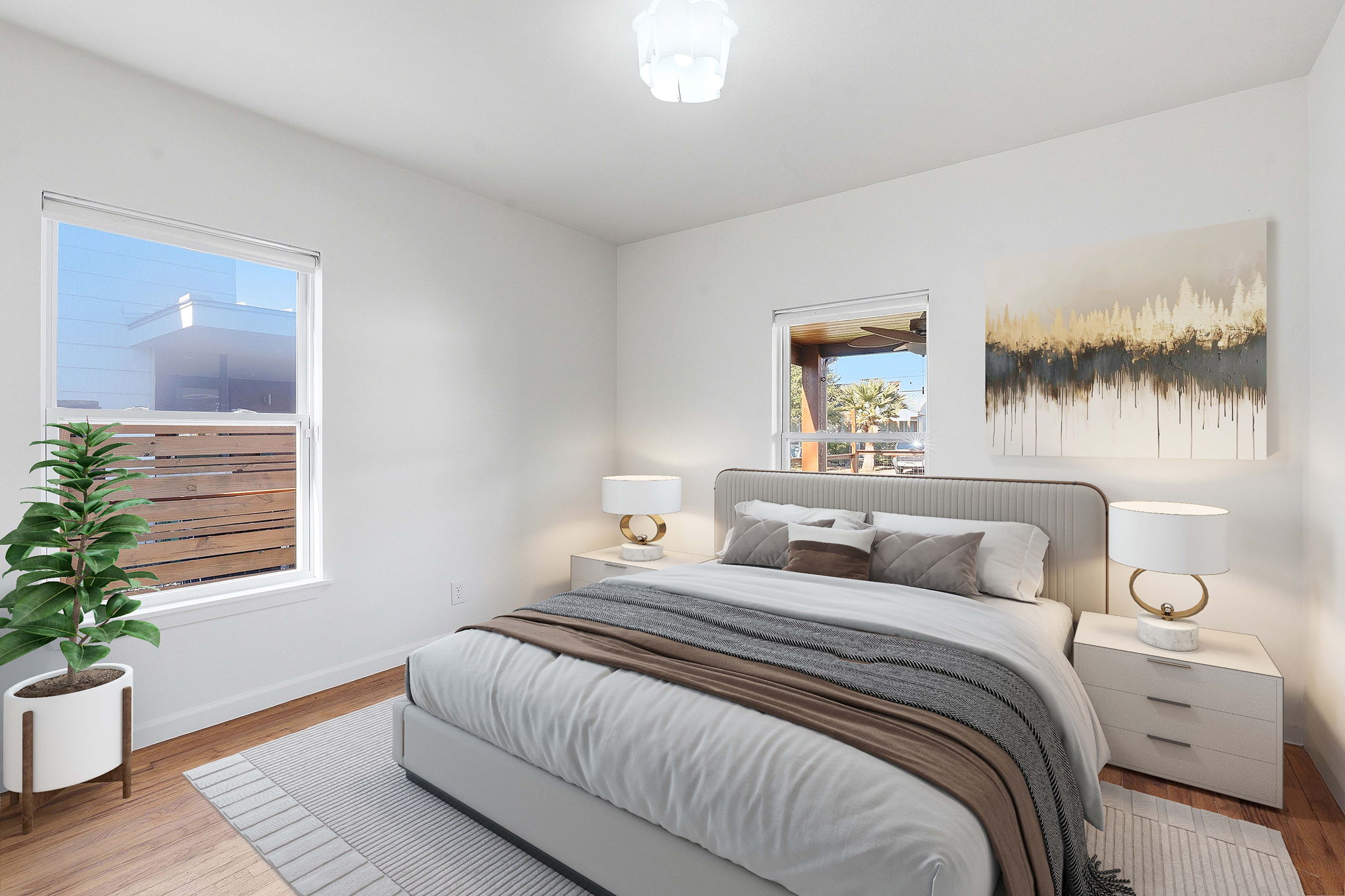 5509 Avenue F Austin, TX 78751 - Photo 22 of 40 The other secondary bedroom comes with the updated wood look flooring.