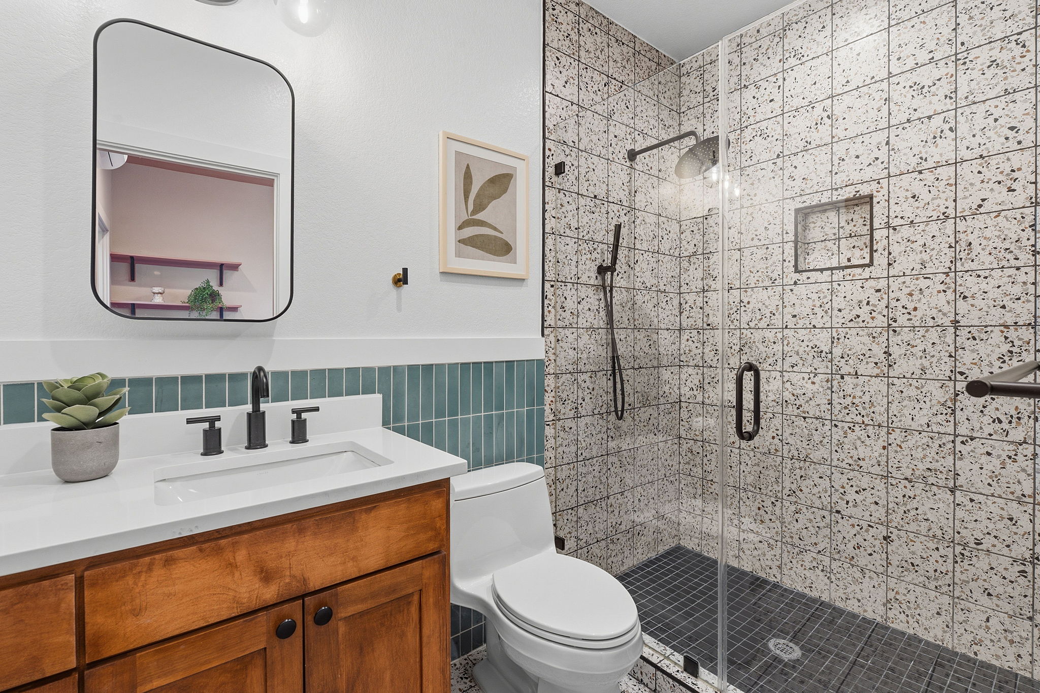 5509 Avenue F Austin, TX 78751 - Photo 32 of 40 The full bath is designed to impress with a luxury walk-in shower and tastefully selected modern finishes.