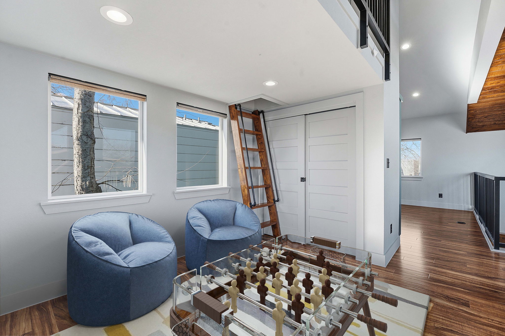 5509 Avenue F Austin, TX 78751 - Photo 36 of 40 The other side of the second floor provides space for a living area, game room, or even guest bed(s).