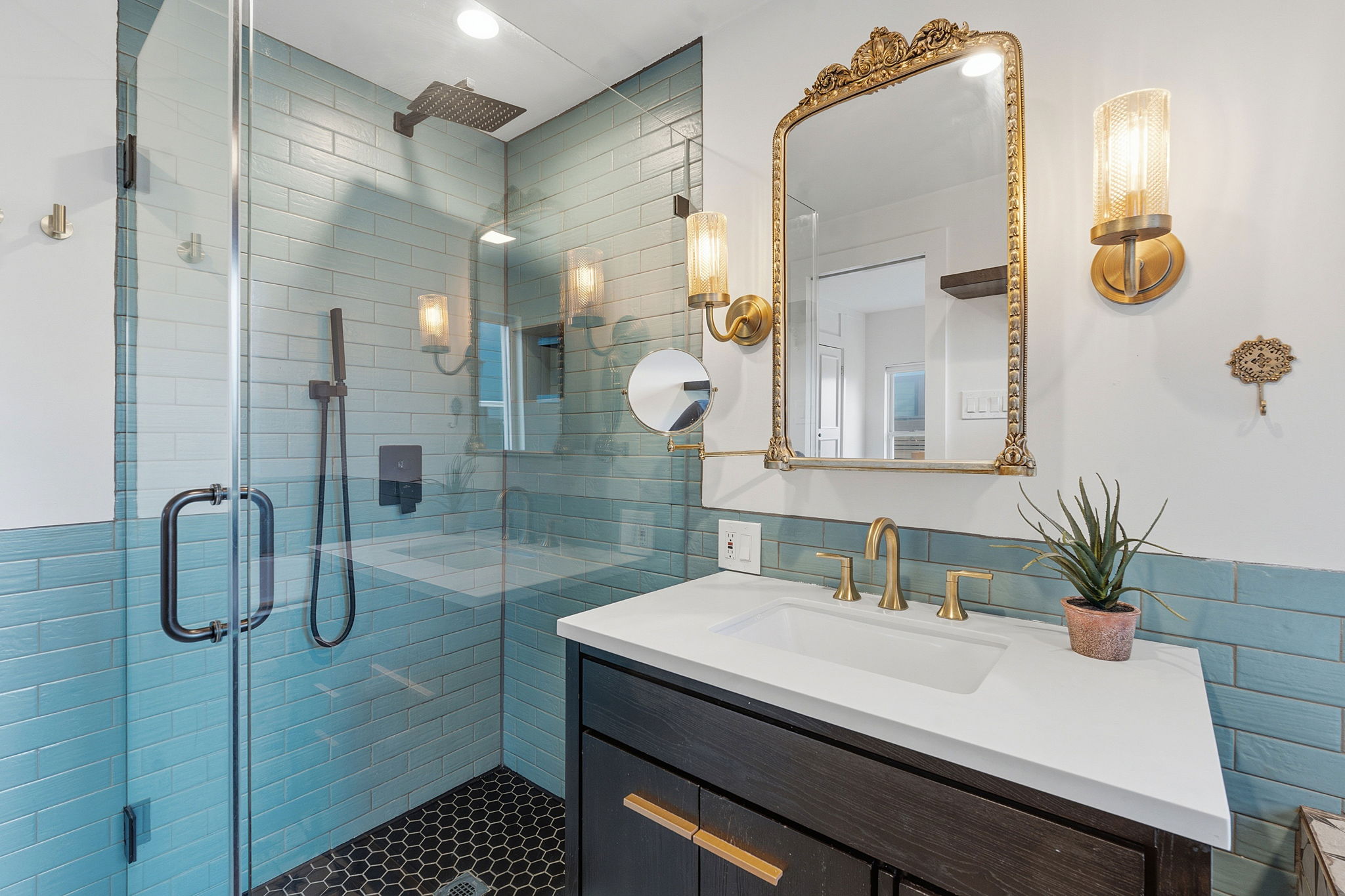 5509 Avenue F Austin, TX 78751 - Photo 4 of 40 The primary ensuite bath serves as your daily spa getaway with a gorgeous built-in soaking tub and a separate frameless glass enclosed luxury shower.
