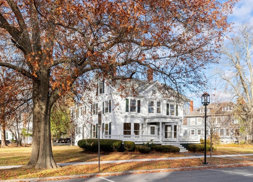 a front view of a building with street view