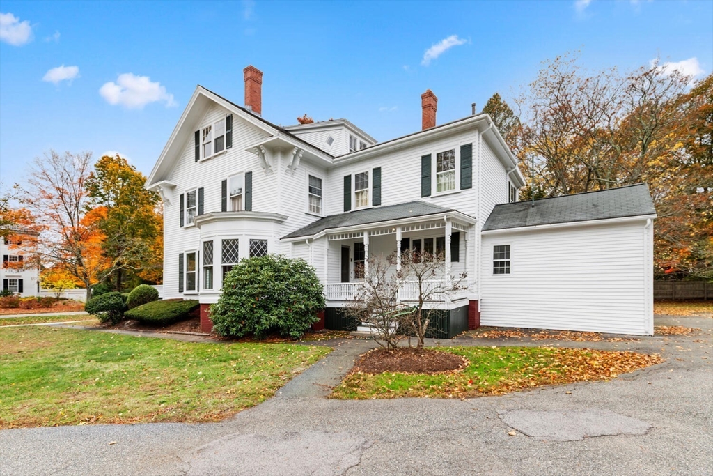 1949 Massachusetts Avenue Lexington, MA 02421 - Photo 5 of 11 a front view of house with yard and trees around