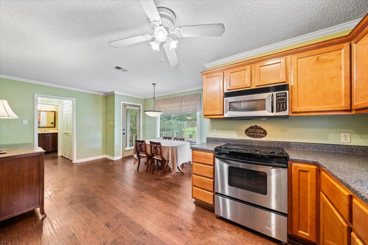 405 Dove Valley Road Collierville, TN 38017 - Photo 11 of 25 a kitchen with a stove oven and a sink