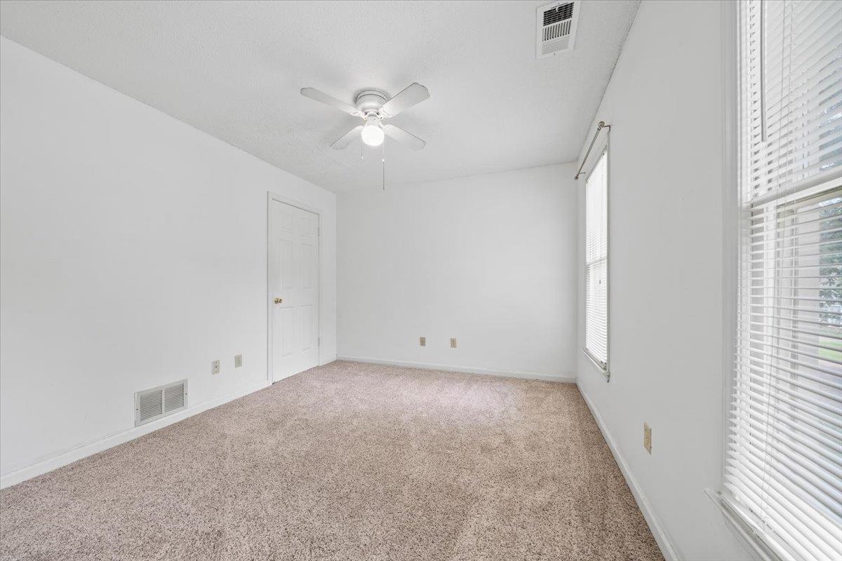405 Dove Valley Road Collierville, TN 38017 - Photo 15 of 25 a view of an empty room with a window