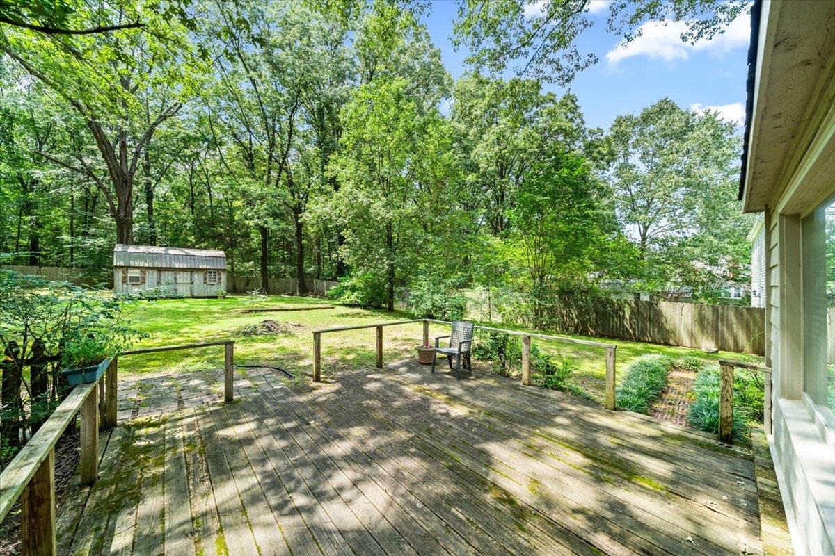 405 Dove Valley Road Collierville, TN 38017 - Photo 19 of 25 a view of a bench in a garden