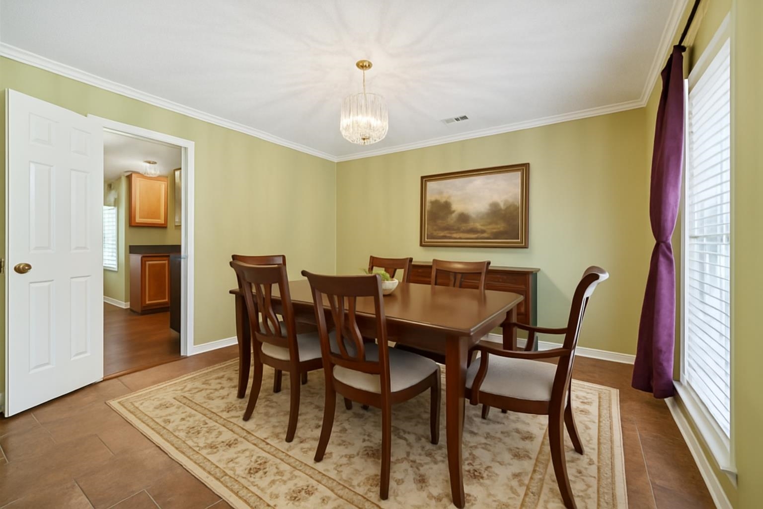 405 Dove Valley Road Collierville, TN 38017 - Photo 23 of 25 a view of a dining room with furniture and wooden floor