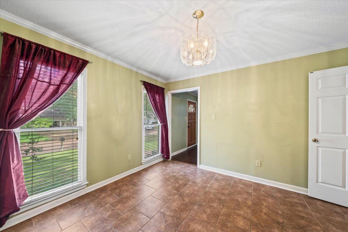 405 Dove Valley Road Collierville, TN 38017 - Photo 6 of 25 a view of an empty room with a window